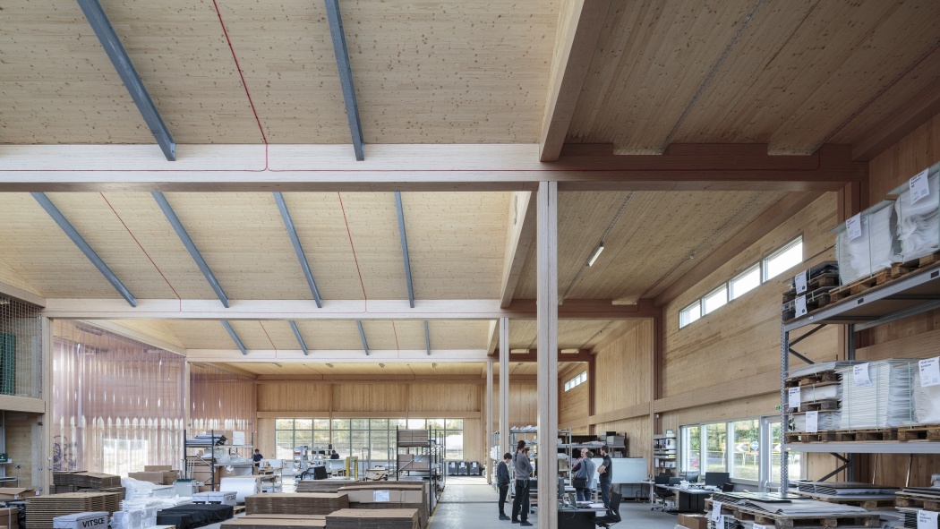 Vitsœ HQ Production building at Leamington Spa. Colleagues during stand up meetings.