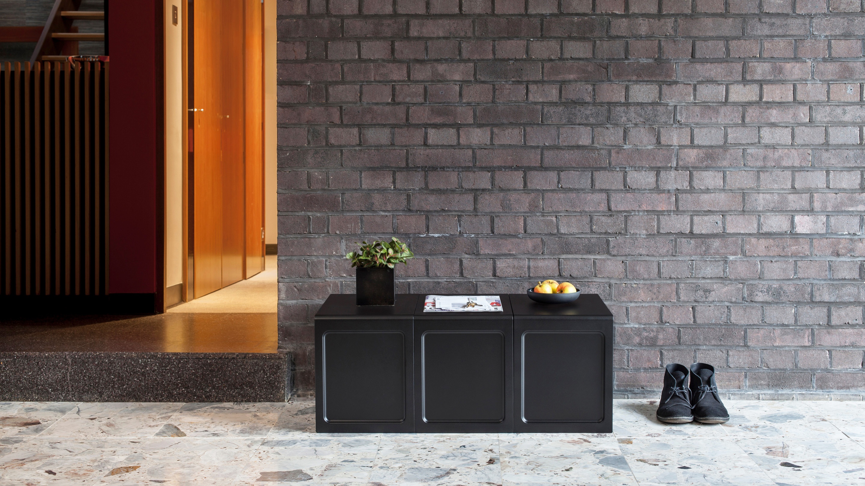 Hallway bench. Vitsœ 621 nesting pair side table. Designer Dieter Rams.