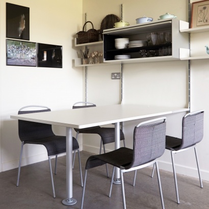 Modular Shelving above desk for home or office, kitchen dining table. wall mounted strong cabinets for kitchenware. Designer Dieter Rams