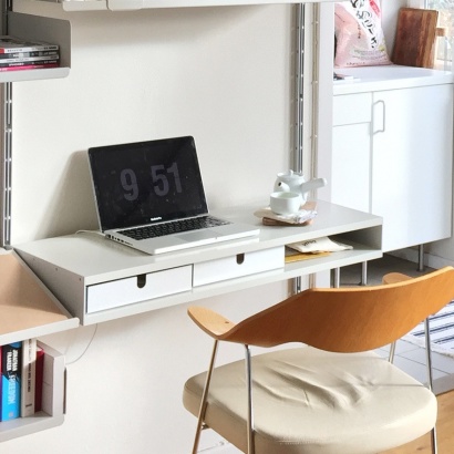 Computer desk and designer shelves. Modular shelving system, strong metal, flexible home workstation.