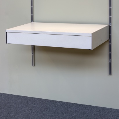 Strong metal shelves with drawer. Modular shelving.designer Dieter Rams