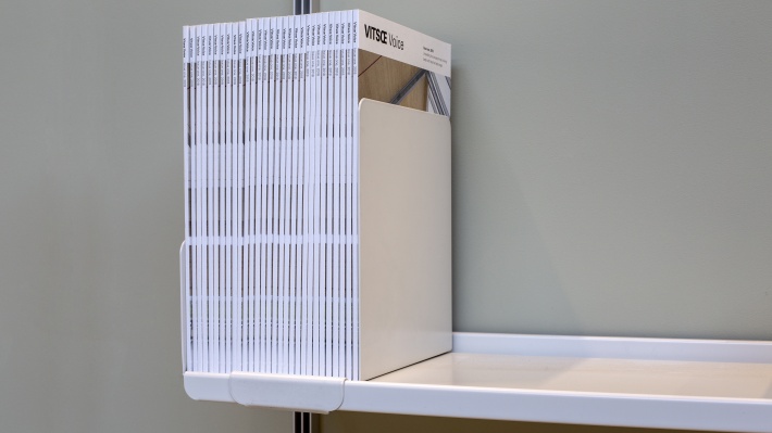 high quality metal bookend for books, vinyl record upright best storage position. Vitsœ shelving. Designer Dieter Rams