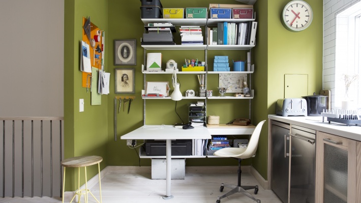 Above desk shelves. Modular shelving system home office for modern studio apartment. Wall mounted strong shelves for box-file storage, printer. Designer Dieter Ram