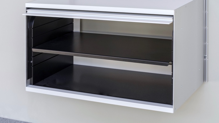 wall mounted up and over door cabinet with internal shelf to divide space and organise